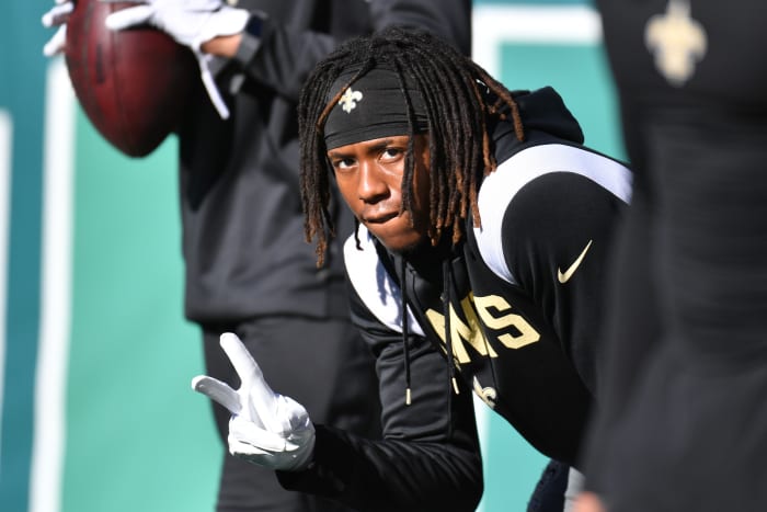 Rashid Shaheed flashes the peace hand sign to cameras before game against the Philadelphia Eagles.